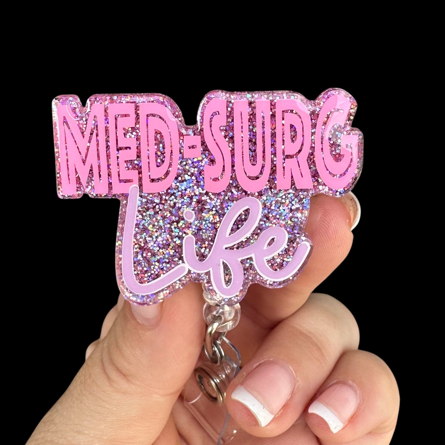 Pink glittery badge holder with 'MED-SURG Life' text