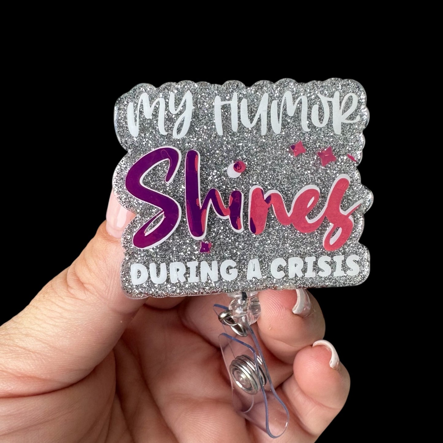 Badge holder with 'My Humor Shines During a Crisis' text