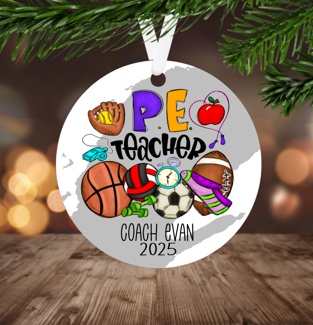 Decorative Christmas ornament for a PE teacher with sports-themed design, hanging on a tree.