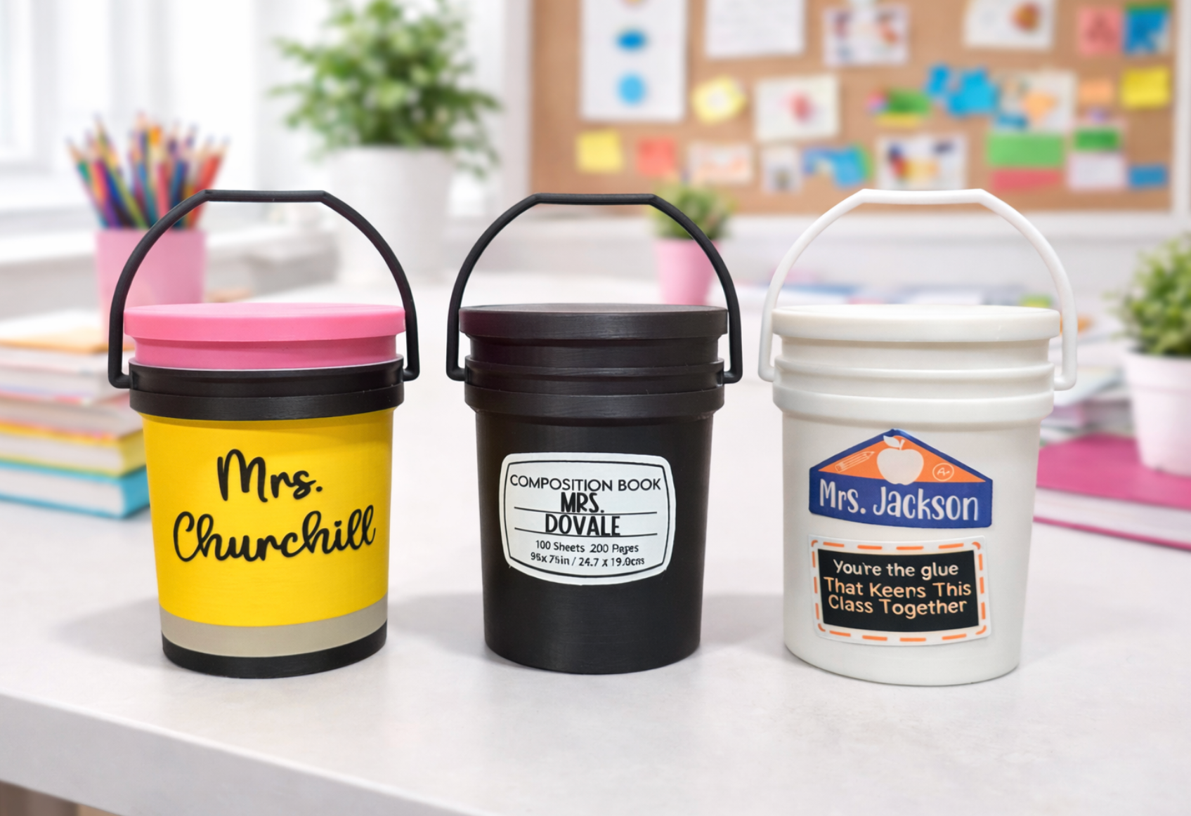 Three labeled buckets on a desk with a classroom setting in the background