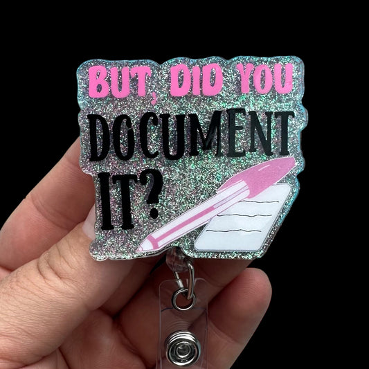 Glittery badge holder with 'But, did you document it?' text and pen illustration.