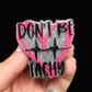 A badge reel with a pink and silver design, featuring text and a heart graphic, indicating a playful theme related to nursing.