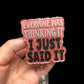 A hand holding a badge reel with the text 'EVERYONE WAS THINKING IT I JUST SAID IT' in alternating red and black layers.