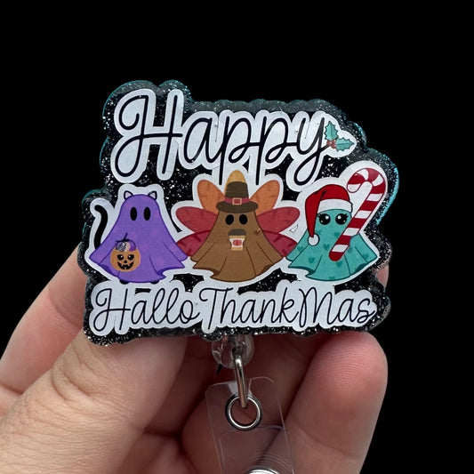 Decorative badge reel with ghost characters and Happy HalloThankMas