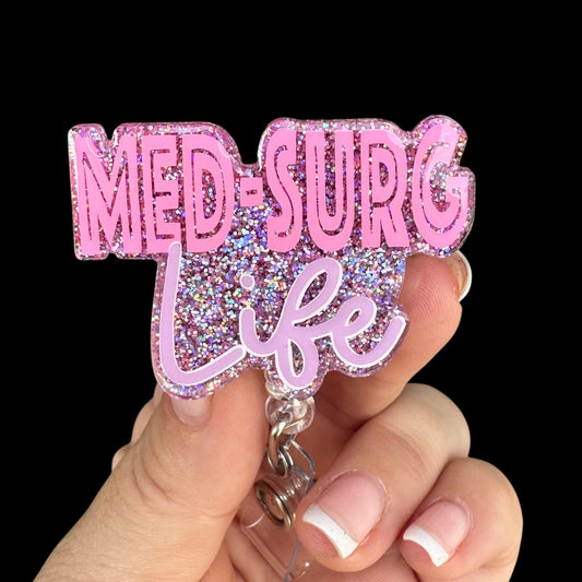 Pink glittery badge holder with 'MED-SURG Life' text