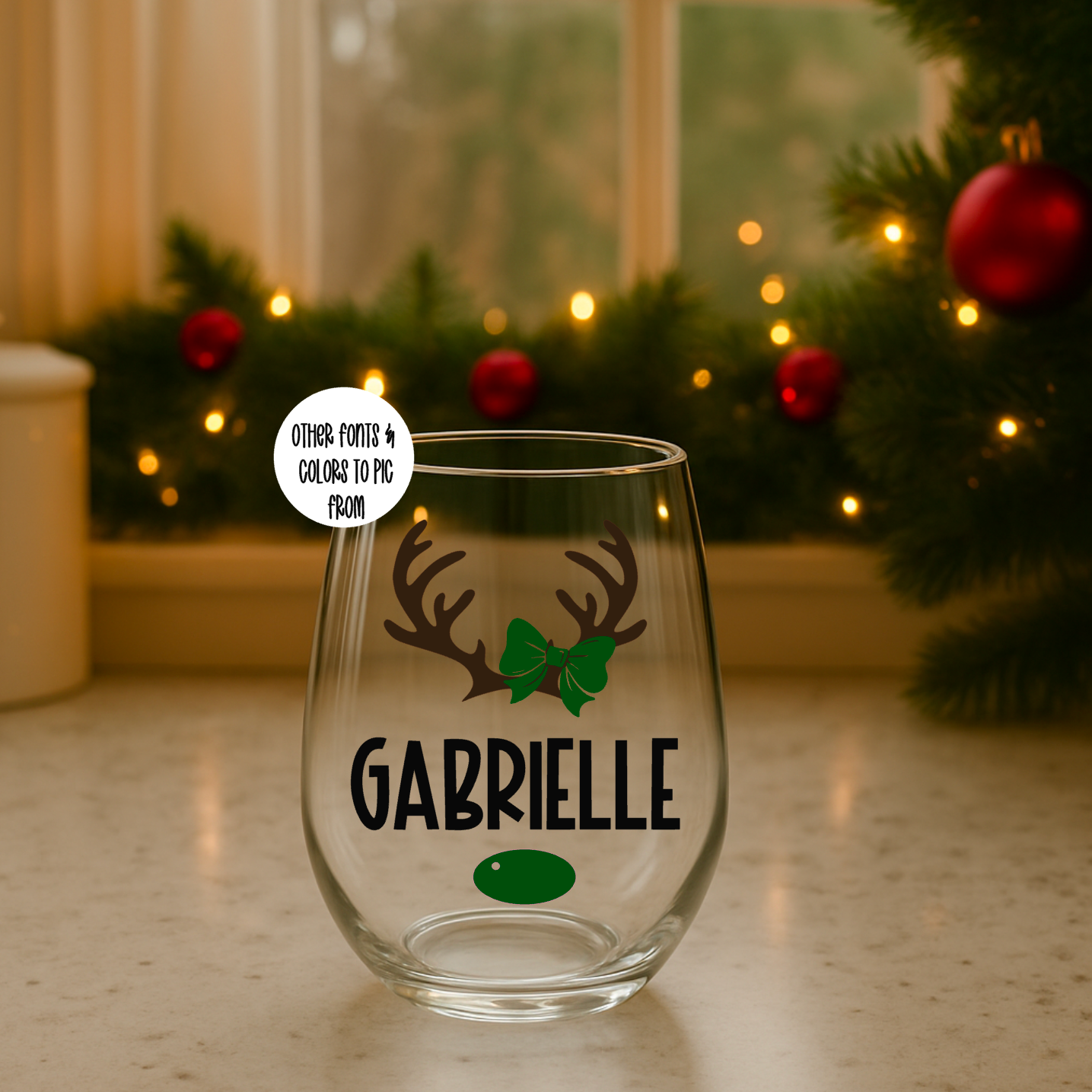 Clear 15oz glass with personalized design of antlers and bow, featuring a name on it.