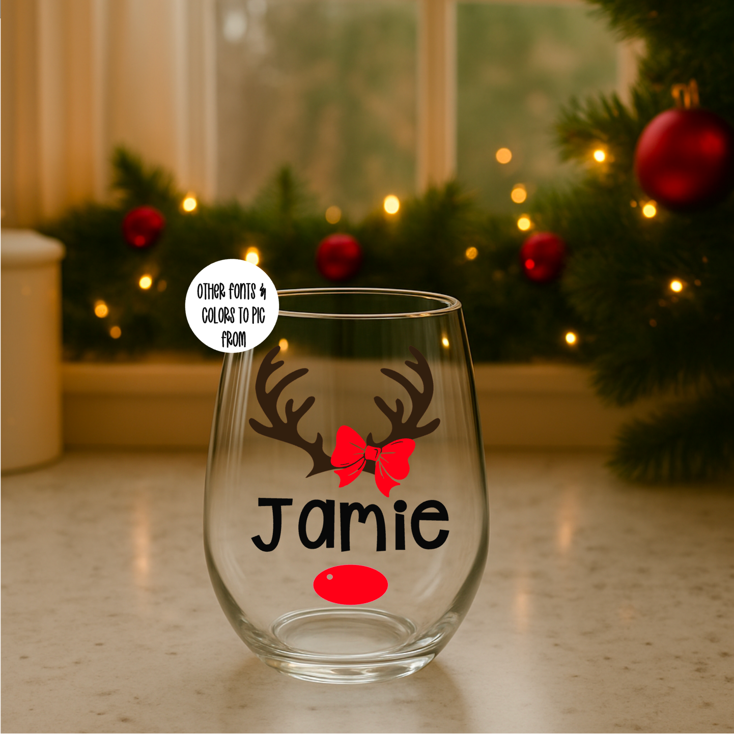 Clear 15oz glass with personalized design of antlers and bow, featuring a name on it