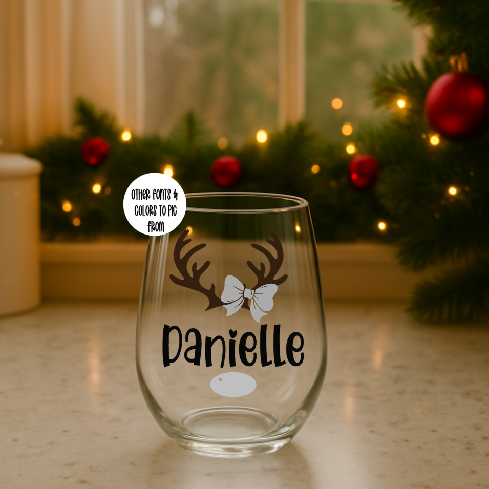 Clear 15oz glass with personalized design of antlers and bow, featuring a name on it