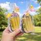 Two pencil-shaped bookmarks with names on them, 